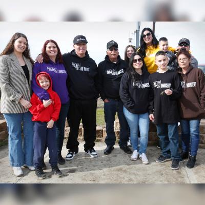 Humberto (Beto) Duran (fourth from left) stands with family and LPI staff after his release on Jan. 11, 2023.